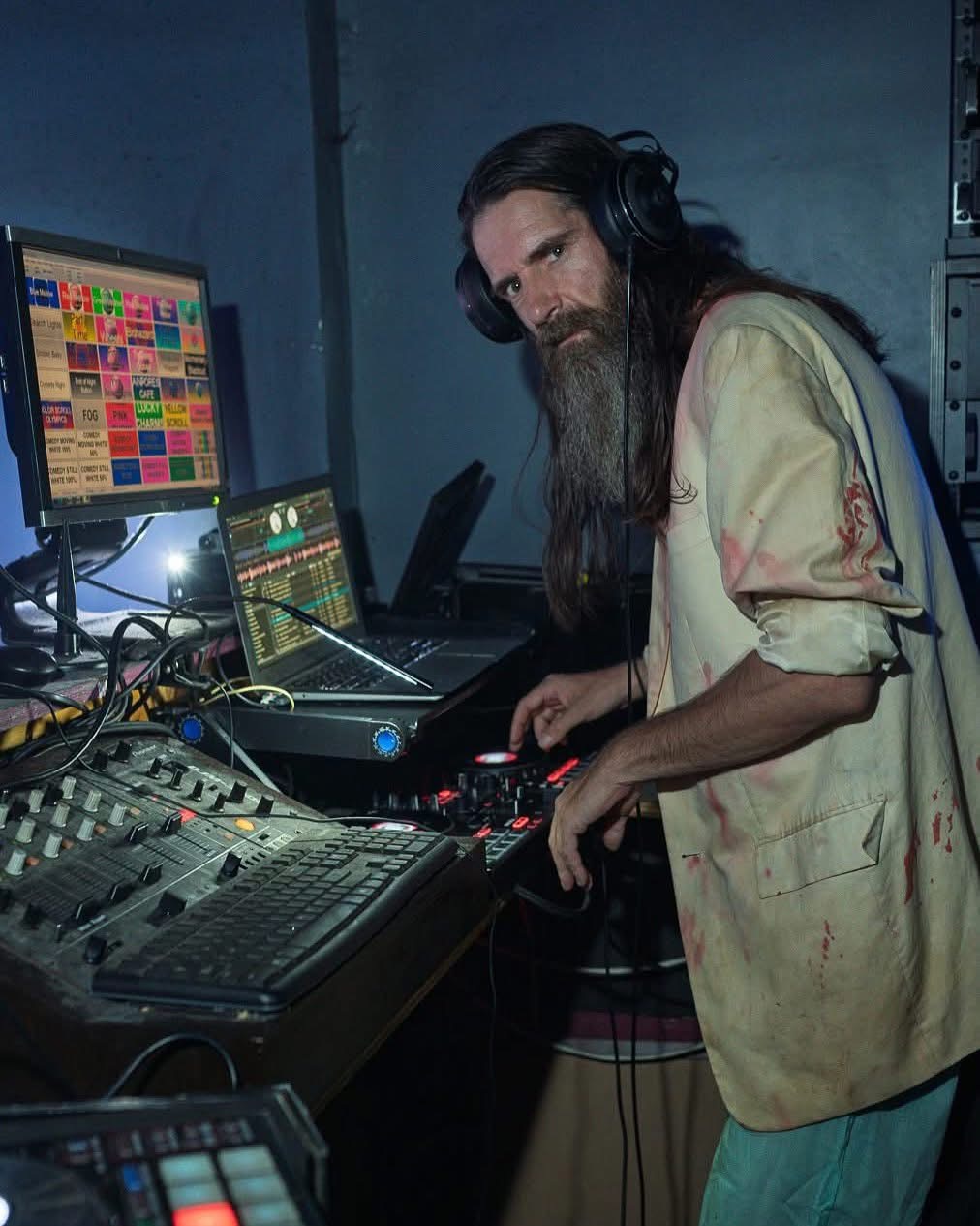 MR. SATAN behind a DJ booth.